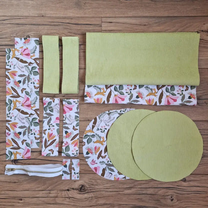 Kit couture sac polochon avec pièces prédécoupées vert anis, tissu fleuri, sangles et fermeture zippée