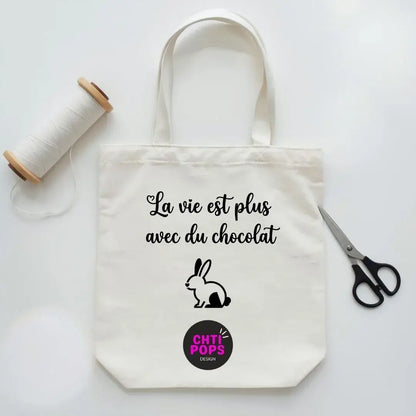 tote bag coton écru avec texte Pâques la vie est plus avec du chocolat et lapin imprimé