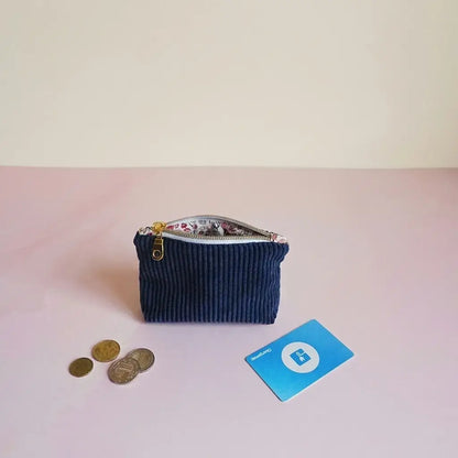 Porte-monnaie zippé bleu marine en velours côtelé, doublure fleurie et zip doré