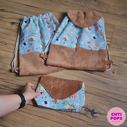 Vidéo de présentation des sacs pochons au motif kawai et velours côtelé marron avec ou sans rabat par Chtipops Créations. Pochette à scratch avec intérieur en coton enduit assortie en option.