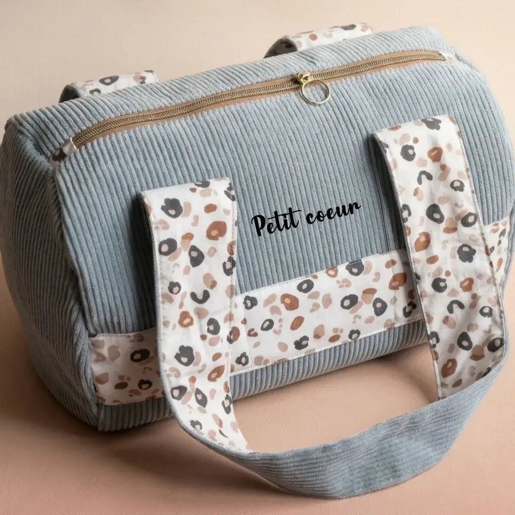 sac polochon velours côtelé bleu clair avec anses tissu imprimé et fermeture zip