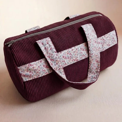 sac polochon velours côtelé prune avec anses fleuries et fermeture zippée