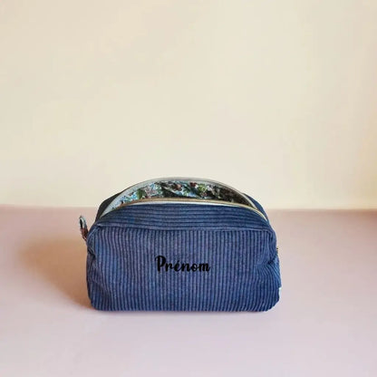 Trousse de toilette bleu marine en velours côtelé avec doublure à feuillages et emplacement du prénom